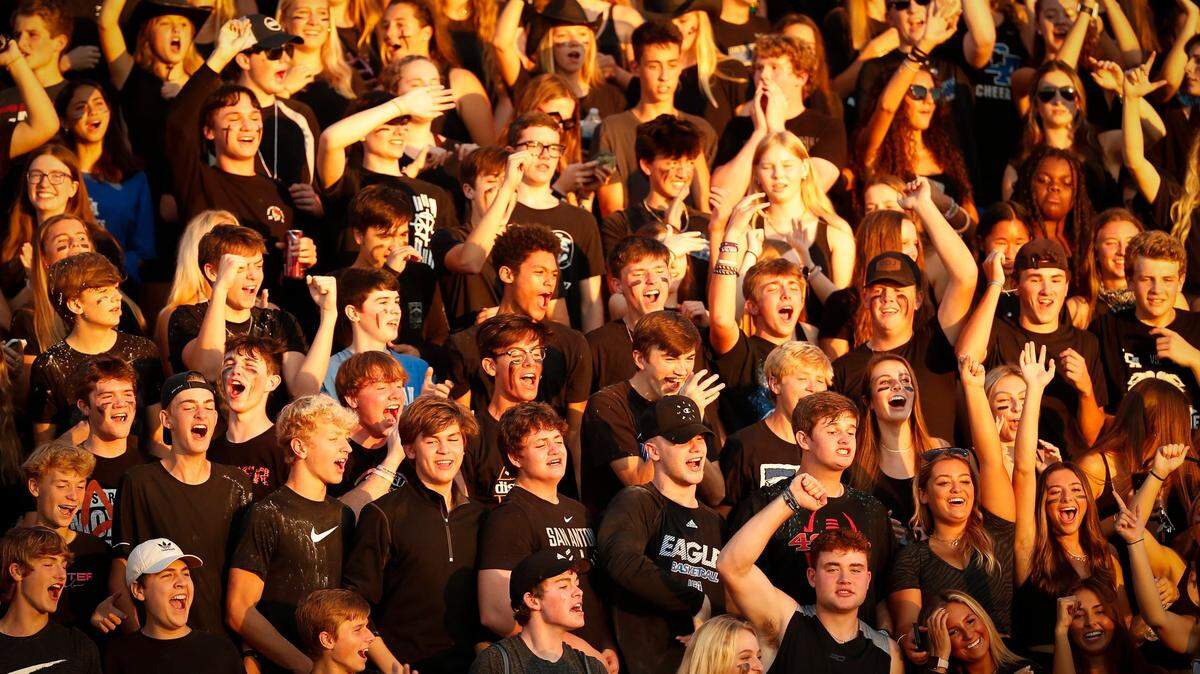 Lexington Christian fans cheered in the stands during a game against Lexington Catholic at Lexington Christian Academy Friday. LCA defeated Lexington Catholic 43-7.