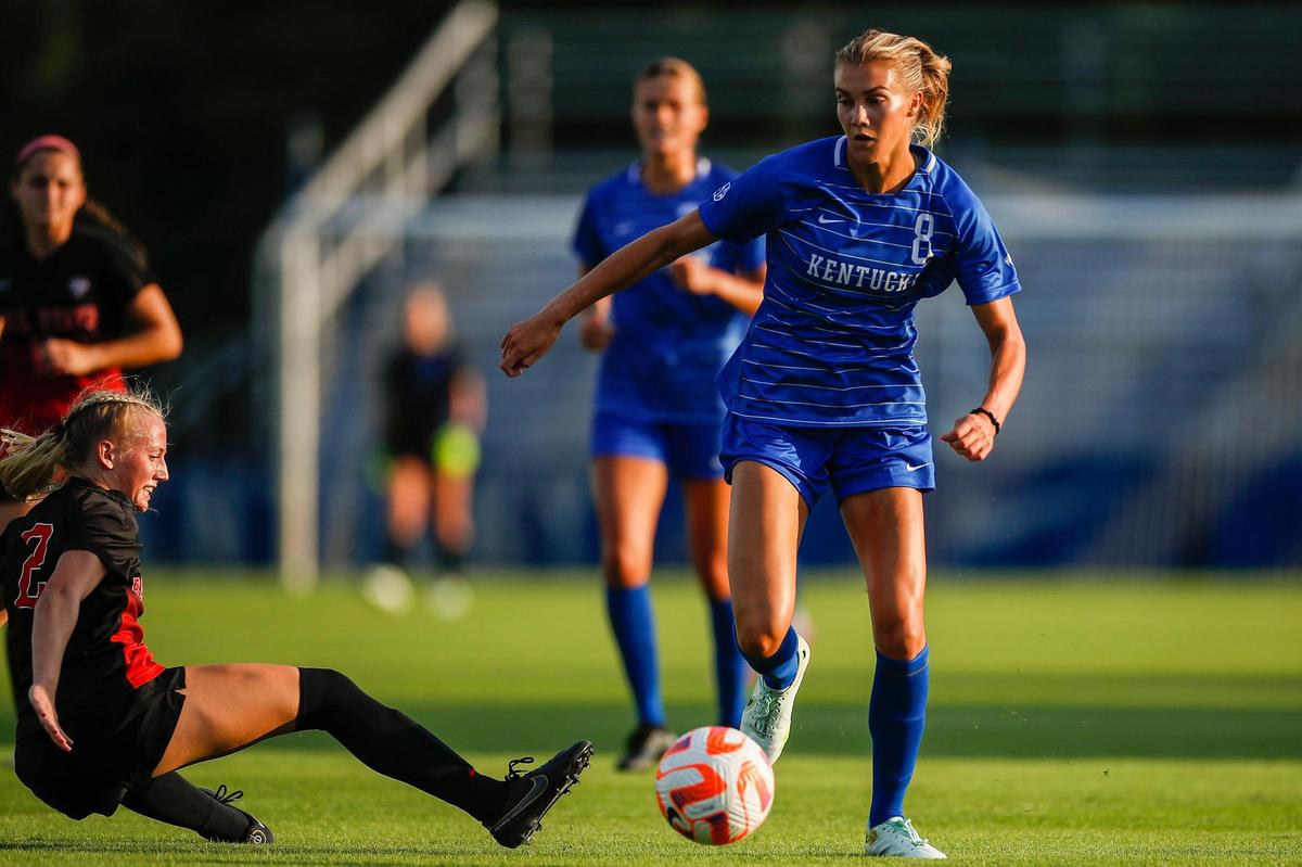 Kentucky senior forward Hannah Richardson (8) breaks away with the ball against Ball State during the Wildcats’ 3-0 season-opening win.