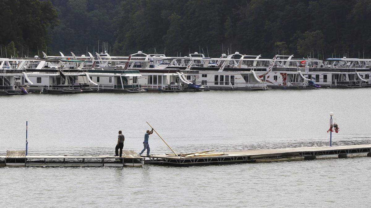 Workers made repairs to the dock last year at Lee's Ford Resort Marina, whose owners are among those opposed to a proposed marina on Lake Cumberland.  