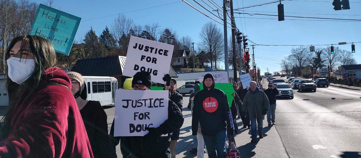 Protesters marched to a parking lot across from the London Police Department in Laurel County, Ky., Saturday, Jan. 4, 2025, to call attention to the death of Douglas Harless. Harless died after being shot at his home by police who apparently had intended to go to a different address nearby to execute a search warrant.