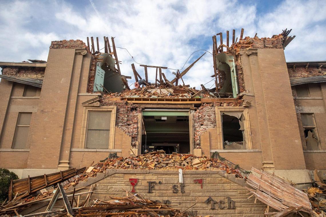 Buildings are demolished in downtown Mayfield, Ky., on Saturday, Dec. 11, 2021, after a tornado traveled through the region Friday night.