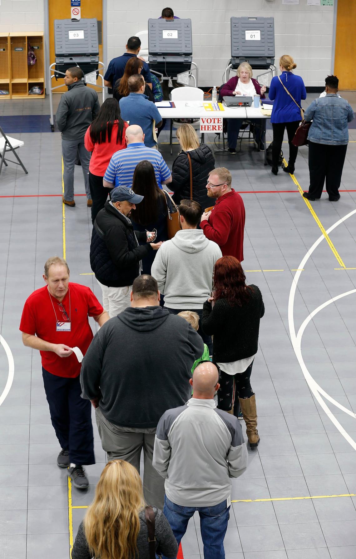 Long lines of voters waited to vote Tuesday morning at the precincts located in Macedonia Christian Church, 4551 Winchester Road in Lexington. The church, which is the location for three voting precincts, Greenbrier, Manny Oaks Park and Shaker Run, was experiencing a heavy voter turnout.