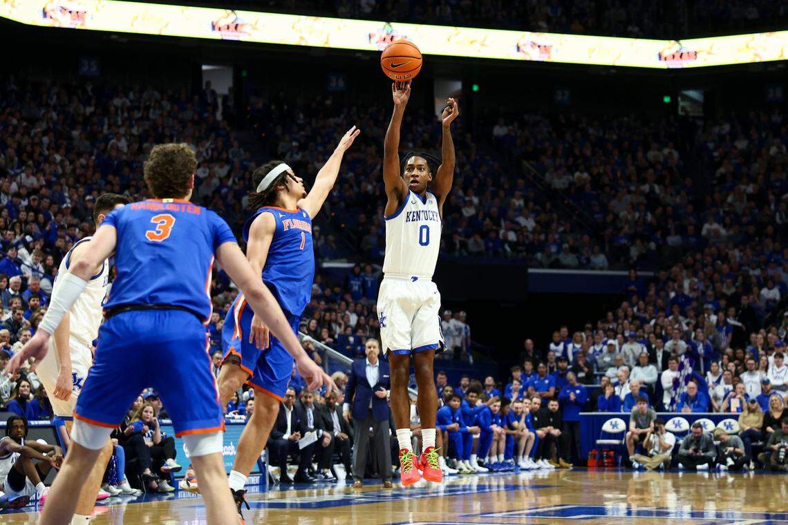 Kentucky guard Rob Dillingham (0) shoots the ball against Florida guard Walter Clayton Jr. (1) during Wednesday’s game at Rupp Arena.
