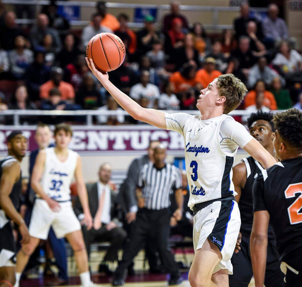 Lexington Catholic’s Jack Gohmann put up a floater during the Knights’ win Thursday night. Gohmann finished with 12 points.
