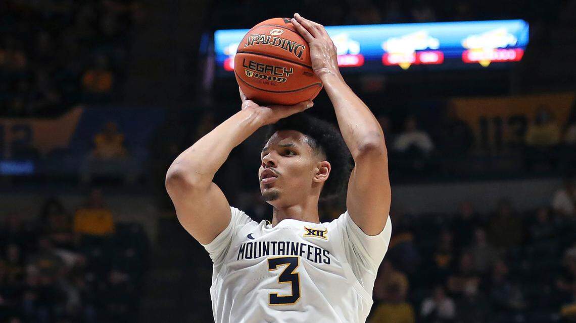 West Virginia forward Tre Mitchell shoots against Navy during the second half of a game in Morgantown, W.Va., on Dec. 7, 2022.