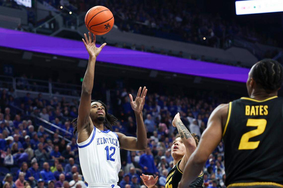 Kentucky’s Antonio Reeves (12) shoots over Missouri’s Noah Carter (35) on Tuesday night.