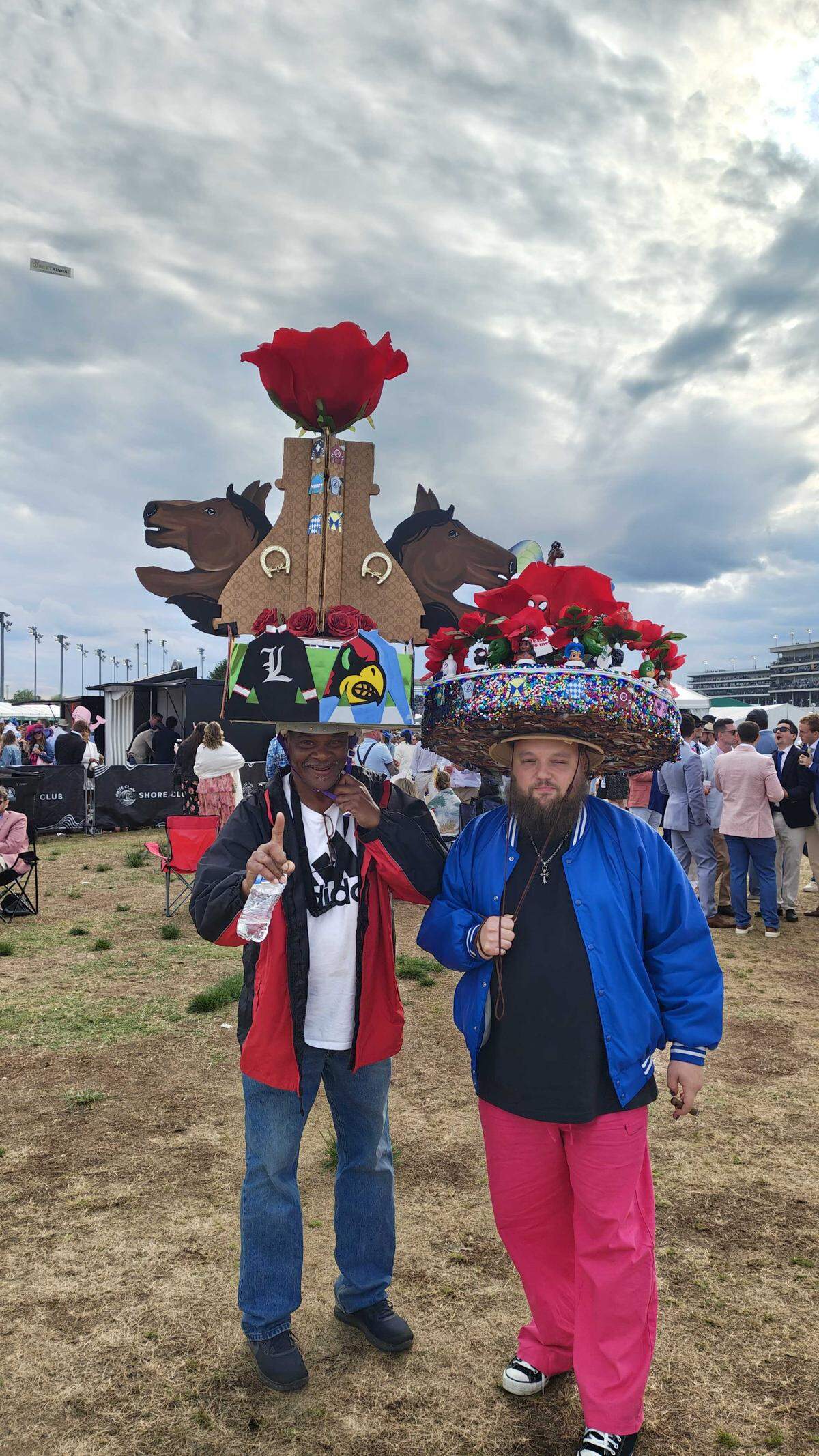 Cedric and DJ Warren Peace don their custom-made Derby hats.