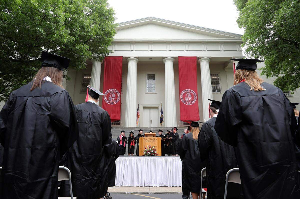 In this file photo, choir seniors sing Hail, Transylvania as Transylvania University held its 237th commencement exercises on the lawn of Old Morrison in Lexington, Ky., Saturday, May 27, 2017.