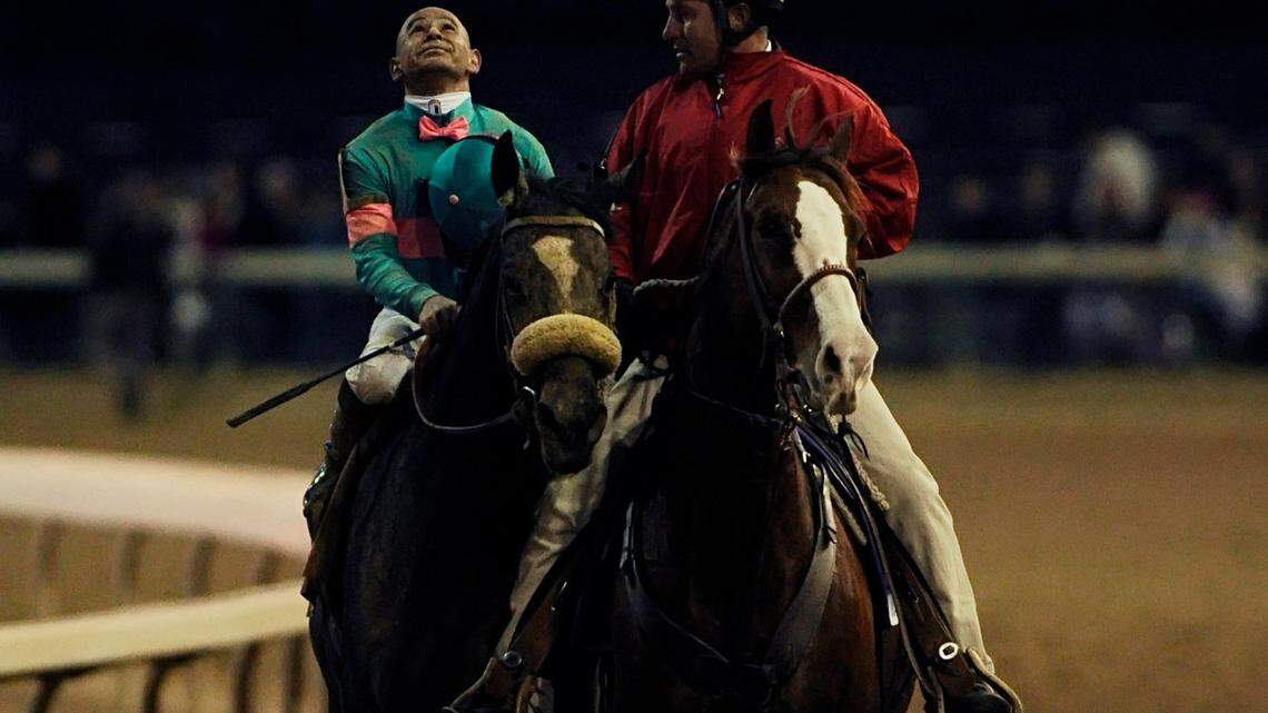 Jockey Mike Smith looked to the sky after riding Zenyatta to a second-place finish in the Breeders' Cup Classic on Saturday. Smith blamed himself for the mare's first loss. "She ran a tremendous race only to get beat by the slimmest of margins," co-owner Jerry Moss said.        