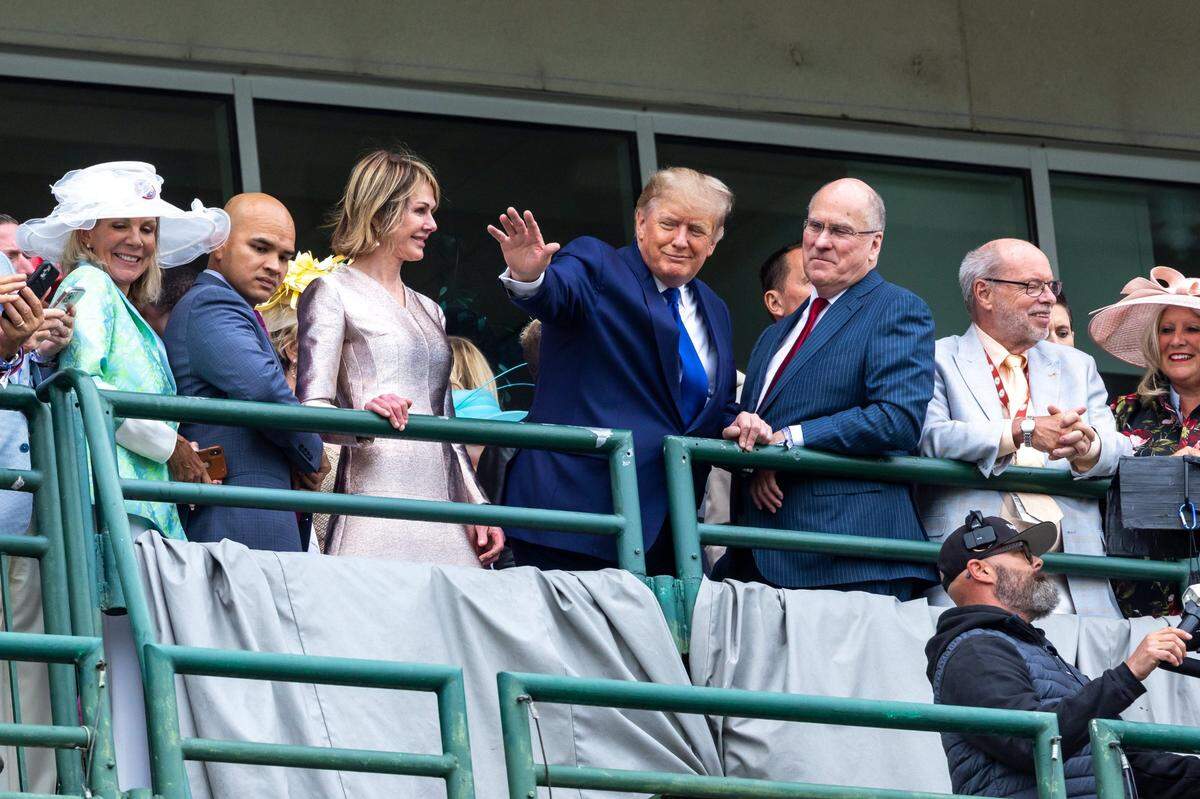 Former President Donald Trump acknowledges the crowd before the 148th Kentucky Derby, Saturday, May 07, 2022 at Churchill Downs in Louisville.