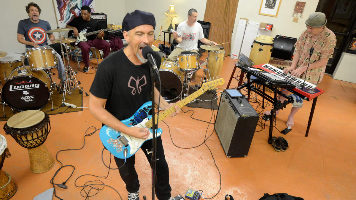 Catawampus Universe (from left): Tim Welch, Steve Cherry, Joel Crisp, Dave Farris and Tripp Bratton. The band rehearsed at Mecca on Manchester Street in Lexington on Aug. 11. Catawampus Universe will play its first shows since 2002 Aug. 16 and 17 at Cosmic Charlies.