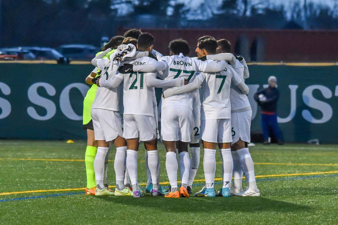 The Lexington SC starting 11 huddle together before battling the Vermont Green FC in a U.S. Open Cup match on Tuesday evening at UVM's Virtue Field. Vermont prevailed 4-3.