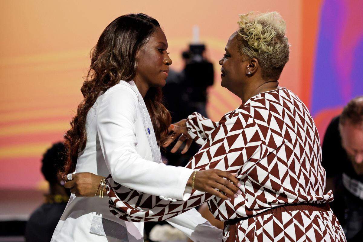 Kentucky’s Rhyne Howard, left, hugs her mom after being selected by the Atlanta Dream as the first overall pick in the WNBA Draft.
