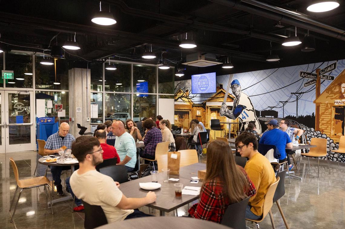 Patrons gather for trivia night at Ethereal Slice House in Lexington, KY, Thursday, November 9, 2023.