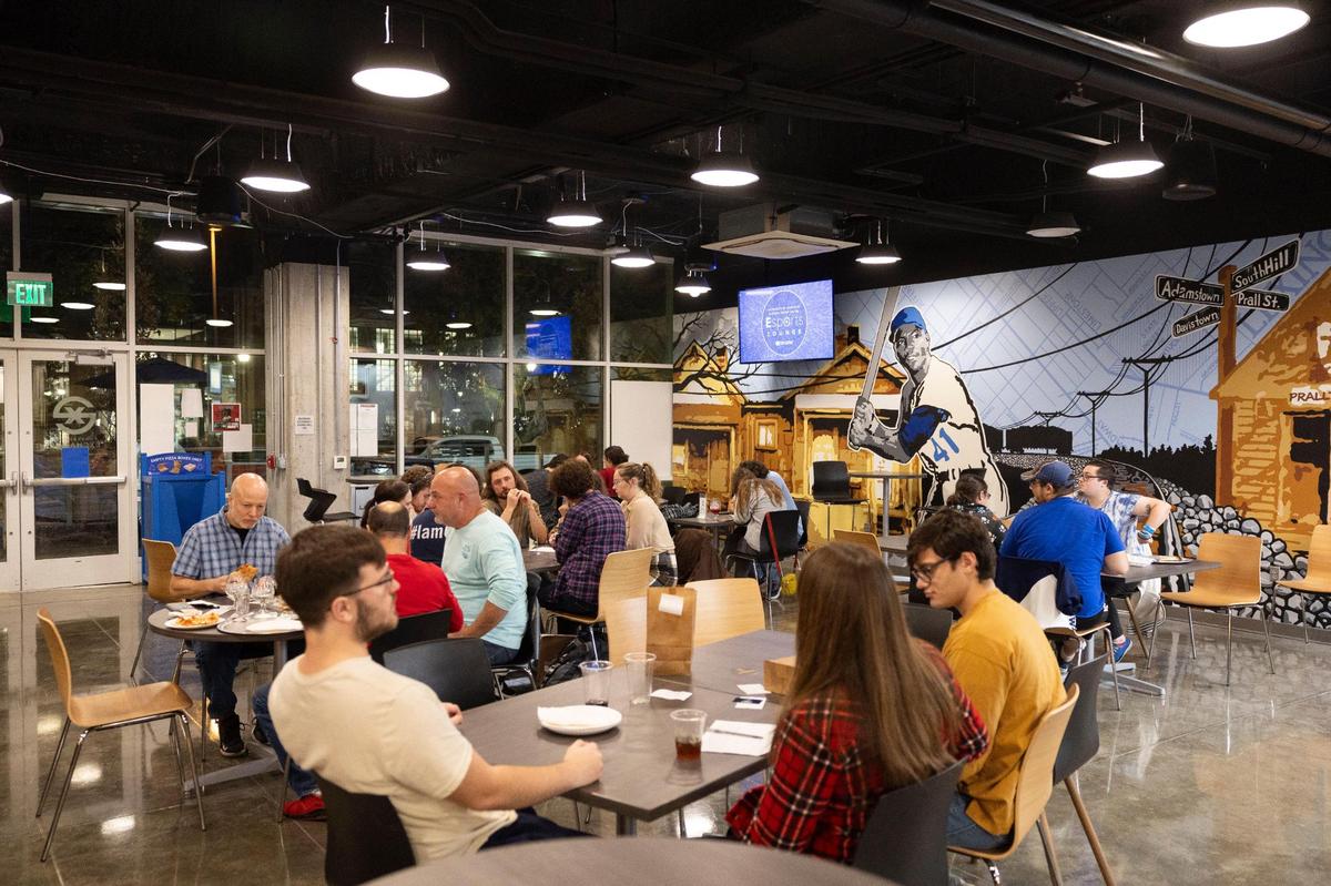 Patrons gather for trivia night at Ethereal Slice House in Lexington, KY, Thursday, November 9, 2023.