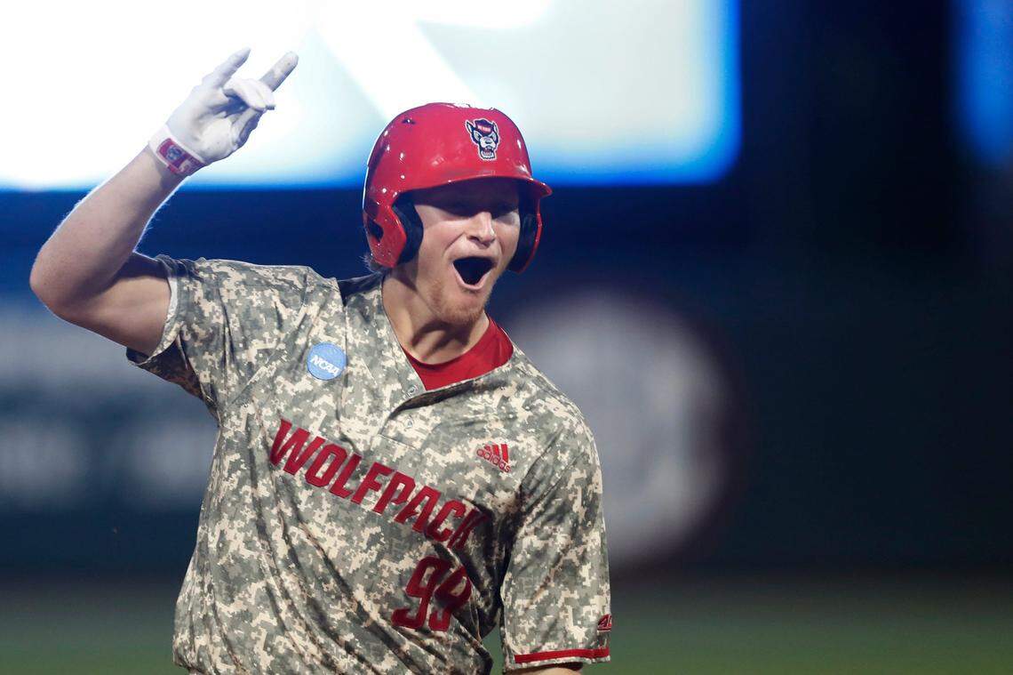 NC State's Alec Makarewicz (99) celebrates after hitting a home run during Game 3 of the Super NCAA Regional against Georgia at Foley Field on Monday, June 10, 2024 in Athens, Ga. NC State won 8-5.