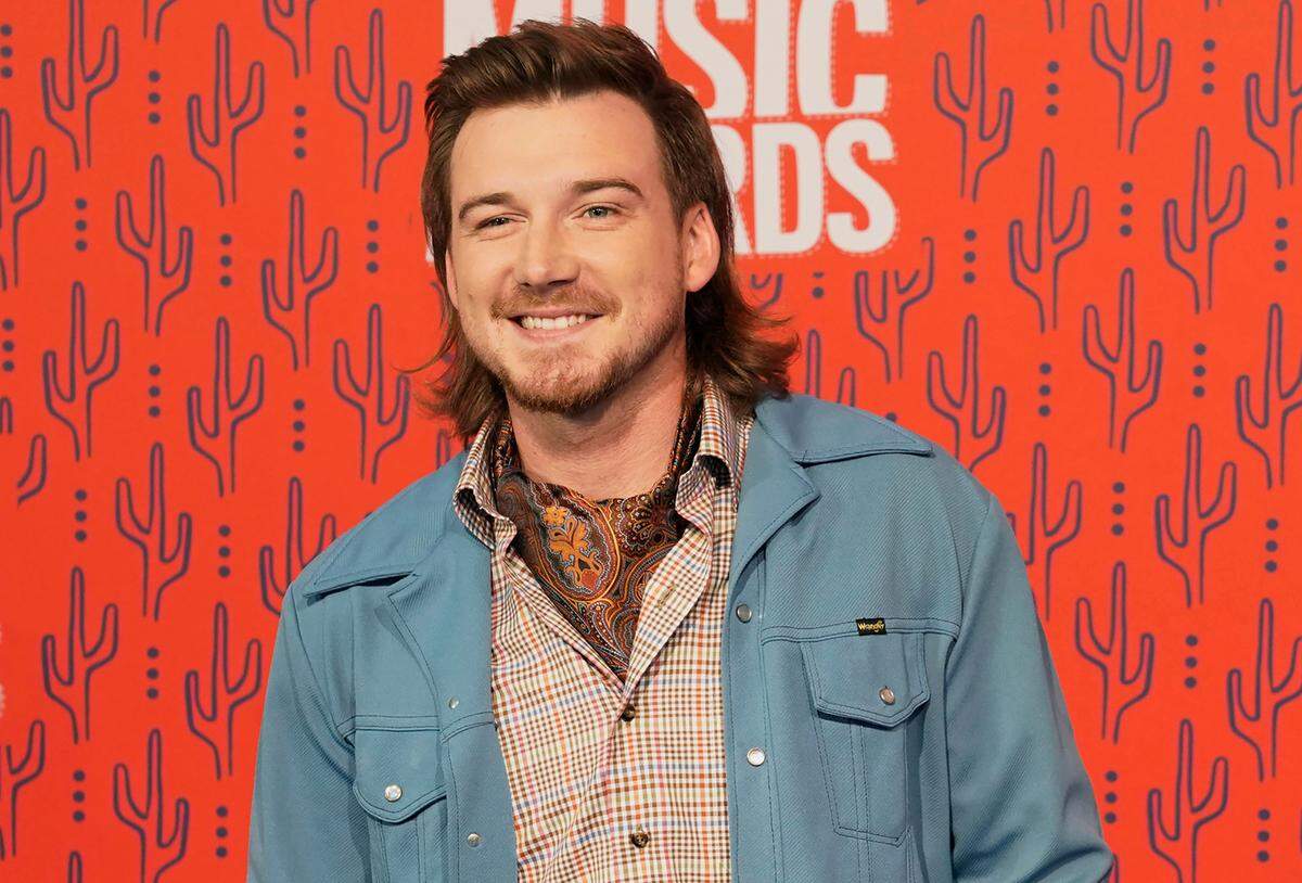 FILE - In this June 5, 2019, file photo, Morgan Wallen arrives at the CMT Music Awards in Nashville, Tenn. Wallen was dropped from performing on “Saturday Night Live” after breaking the show’s COVID-19 protocols. The country singer posted a two-plus minute video on social media Wednesday, Oct. 7, 2020, about the show’s decision. He apologized after he was shown on TikTok socializing mask less at a crowded bar and house party this past weekend in Alabama. (AP Photo/Sanford Myers, File)