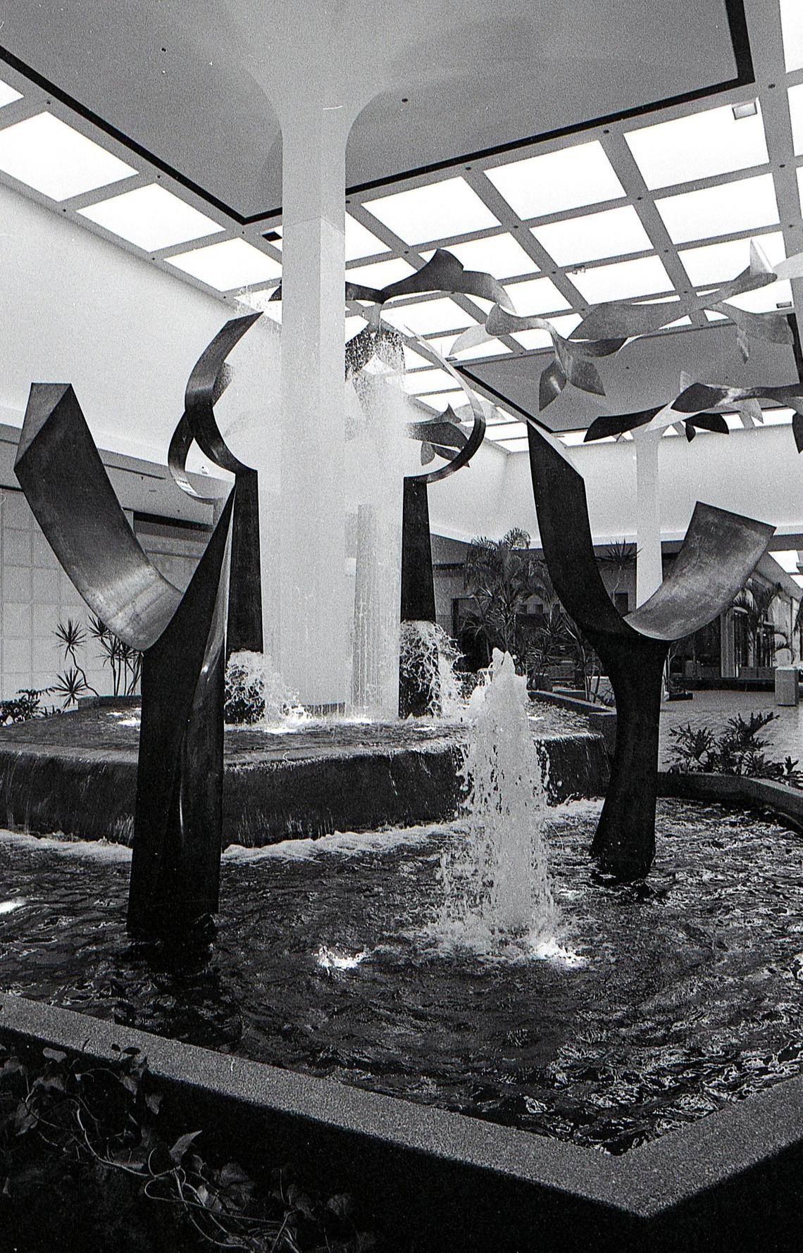 Each of Fayette Mall’s four fountains had a metal sculpture designed by Clarence Van Duzer, a faculty member at the Cleveland Institute for Art. He did sculptures for other malls. This fountain is located where the kids play area is today.