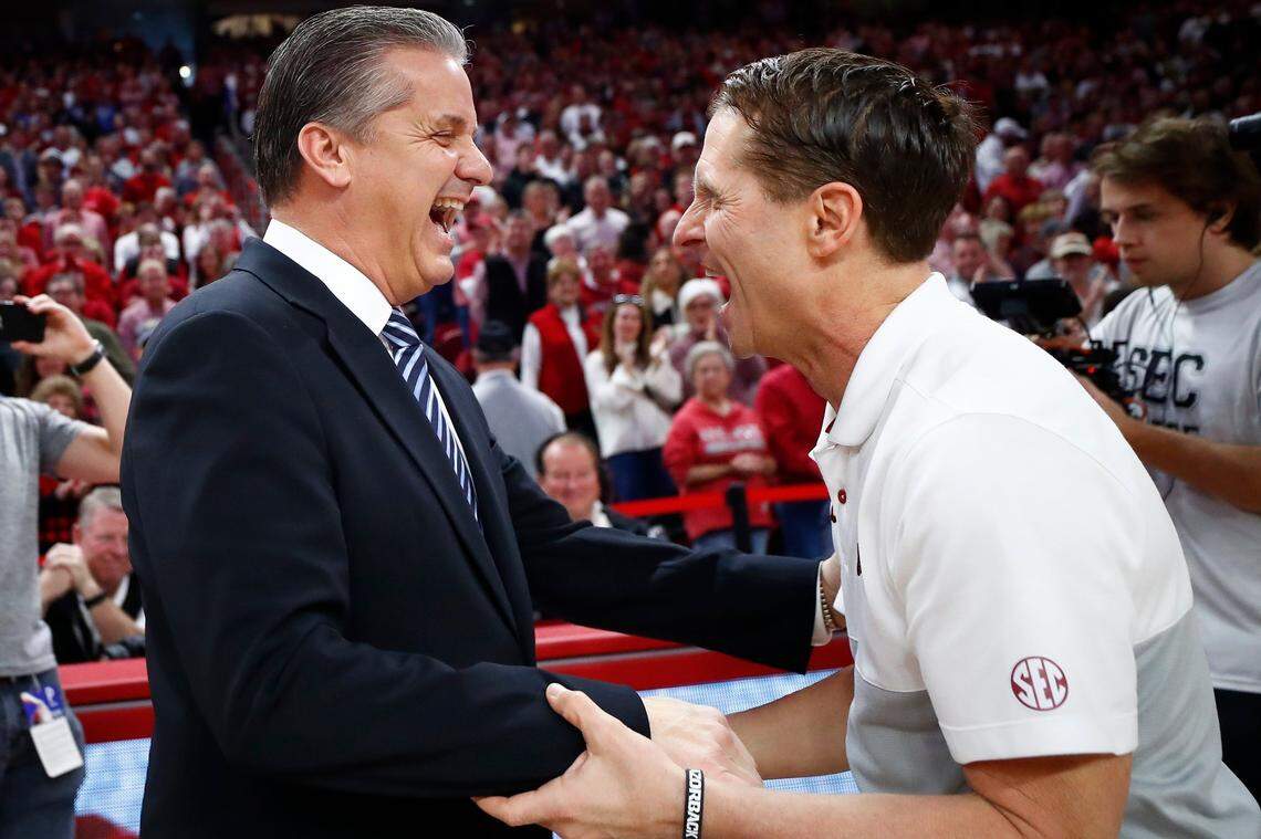 Arkansas Coach Eric Musselman, right, has won three out of four meetings against Kentucky Coach John Calipari, left, since becoming Razorbacks head man in 2019-20.