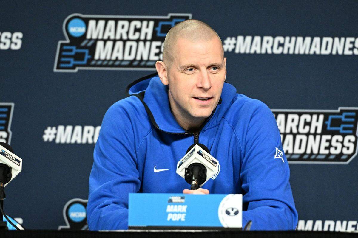 Mar 20, 2024; Omaha, NE, USA;  Brigham Young Cougars head coach Mark Pope talks with the media during the NCAA first round practice session at CHI Health Center Omaha. Mandatory Credit: Steven Branscombe-USA TODAY Sports
