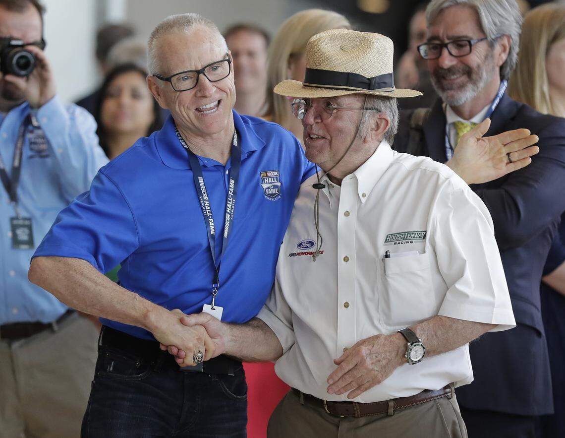 NASCAR team owner Jack Roush, right, was congratulated by former driver Mark Martin, left, after being named to the 2019 class of the NASCAR Hall of Fame.