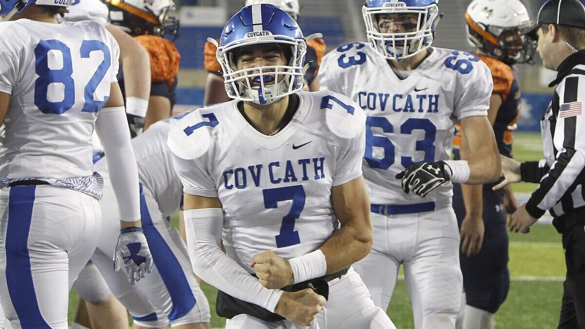 Covington Catholic’s A.J. Mayer celebrated a touchdown run against Madison Southern in the Class 5A state championship game at Kroger Field last December.