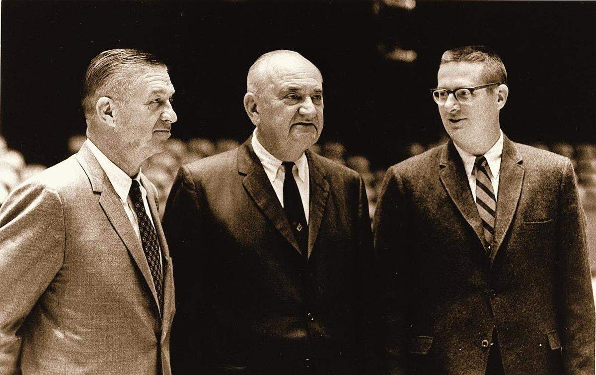 Adolph Rupp, center, and assistant coaches Harry Lancaster, left, and Joe B. Hall presided over the 1966-67 Kentucky team, the last group to lose three straight home games. It was Rupp’s worst season in 42 years as UK’s coach.
