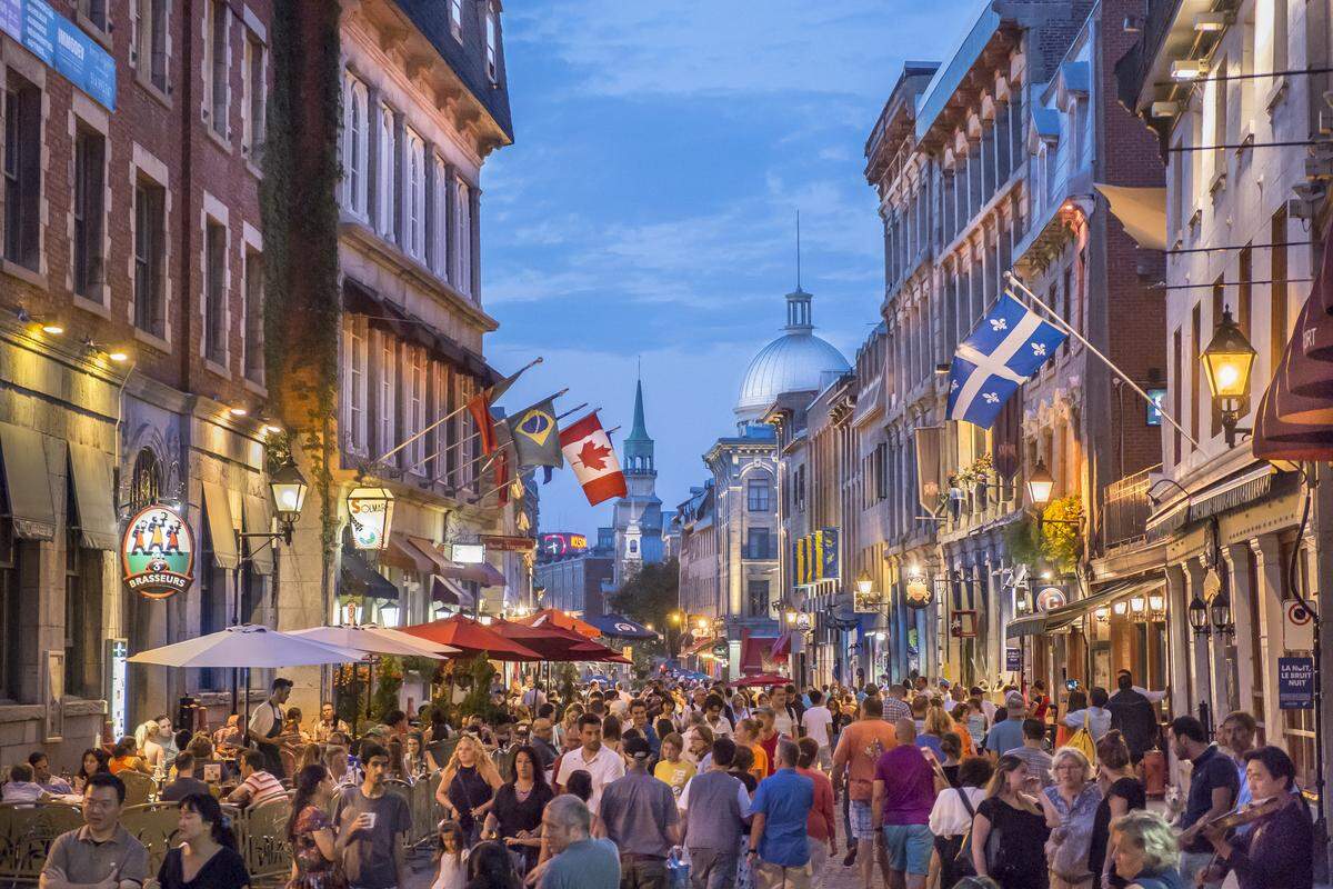 People throng Rue Sainte-Paul in Montreal’s Old Town.