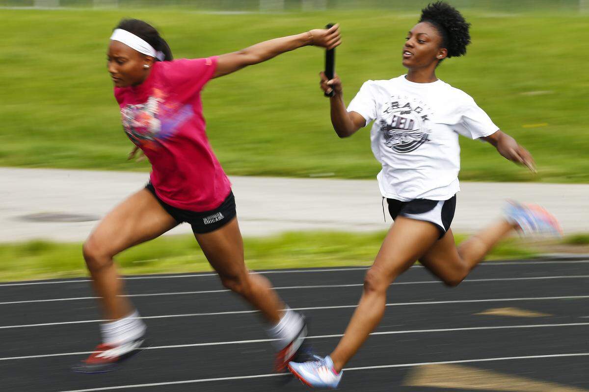 “He builds their mentality. He builds their spirit. He builds them as a person and it helps them become a better runner," said Myann Davidson, right.