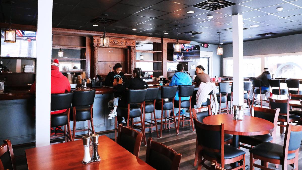 Local patrons dine in at the new Southern soul food restaurant, Sassy Bleu, located on the corner of Woodland and High in Lexington, Ky, on December 11, 2024.