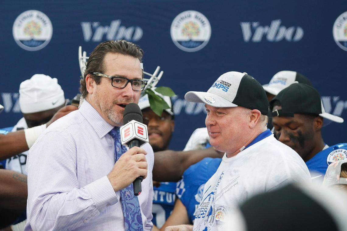 Kentucky head coach Mark Stoops celebrates with his team after its defeat of Iowa, 20-17, in the VRBO Citrus Bowl at Camping World Stadium in Orlando, Fla., on Saturday.