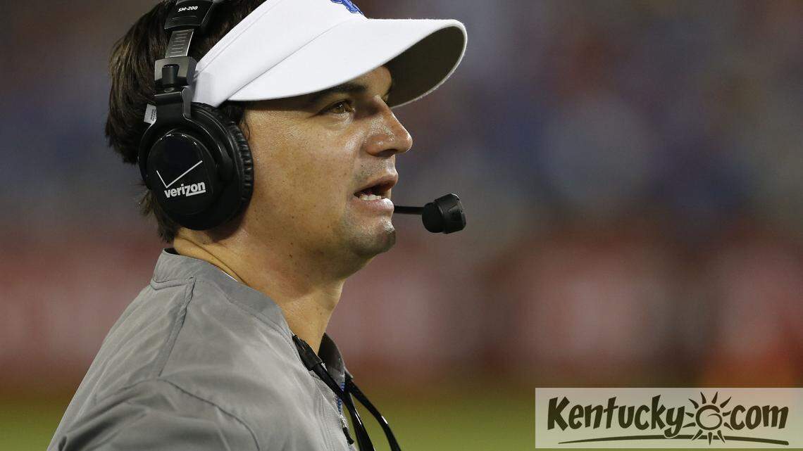 Kentucky offensive coordinator Neal Brown looked on late in the second half as WKU defeated UK 35-26 at LP Field on Saturday August 31, 2013 in Nashville, Tenn. Photos by Mark Cornelison | Staff