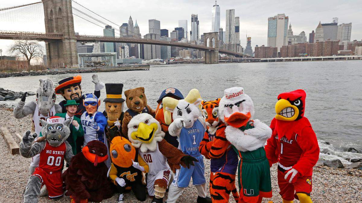 All 15 mascots from the Atlantic Coast Conference pose for a group photograph in front of the Brooklyn Bridge in 2017.