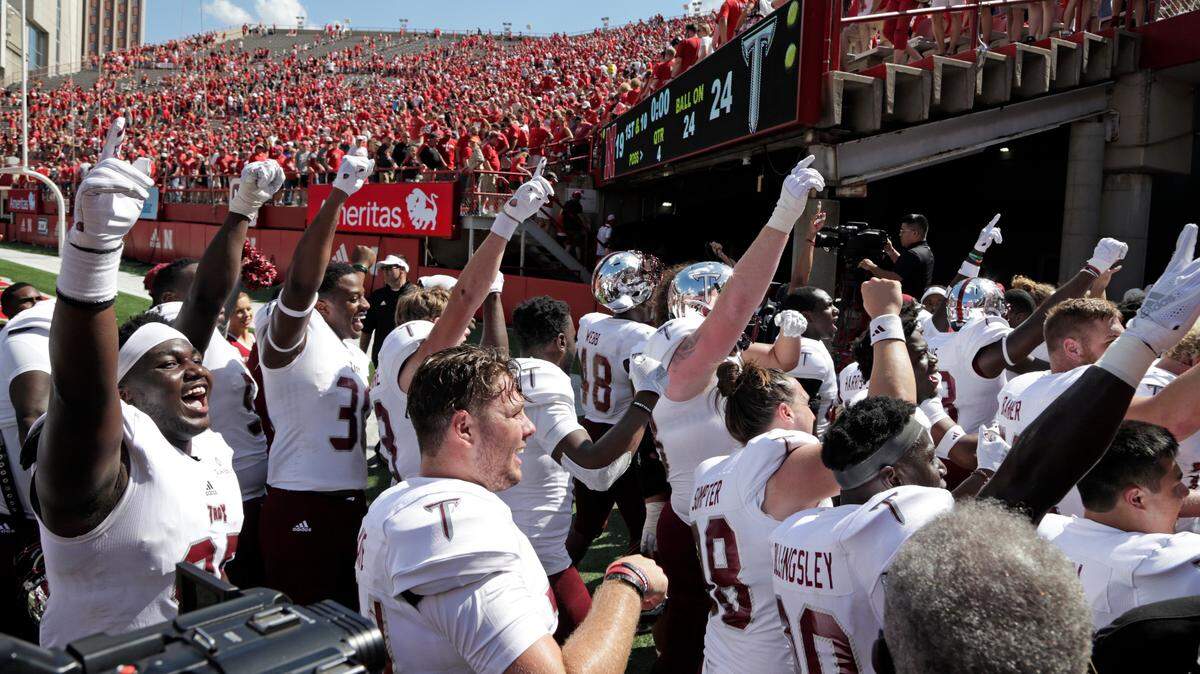 Troy players celebrated after their 24-19 victory at Nebraska. The Trojans were a 9 1/2-point underdog entering Saturday’s game in Lincoln.