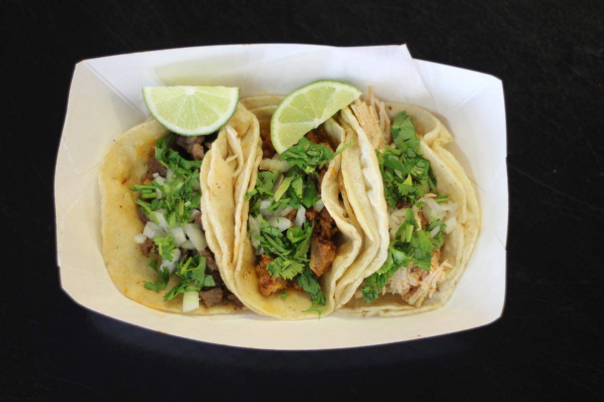 Three Street Tacos from Tienda San Juan Taqueria featuring slow roasted pork, beef, and chicken. San Juan Lexington will open May 5 at Country Boy Brewing on Chair Avenue.