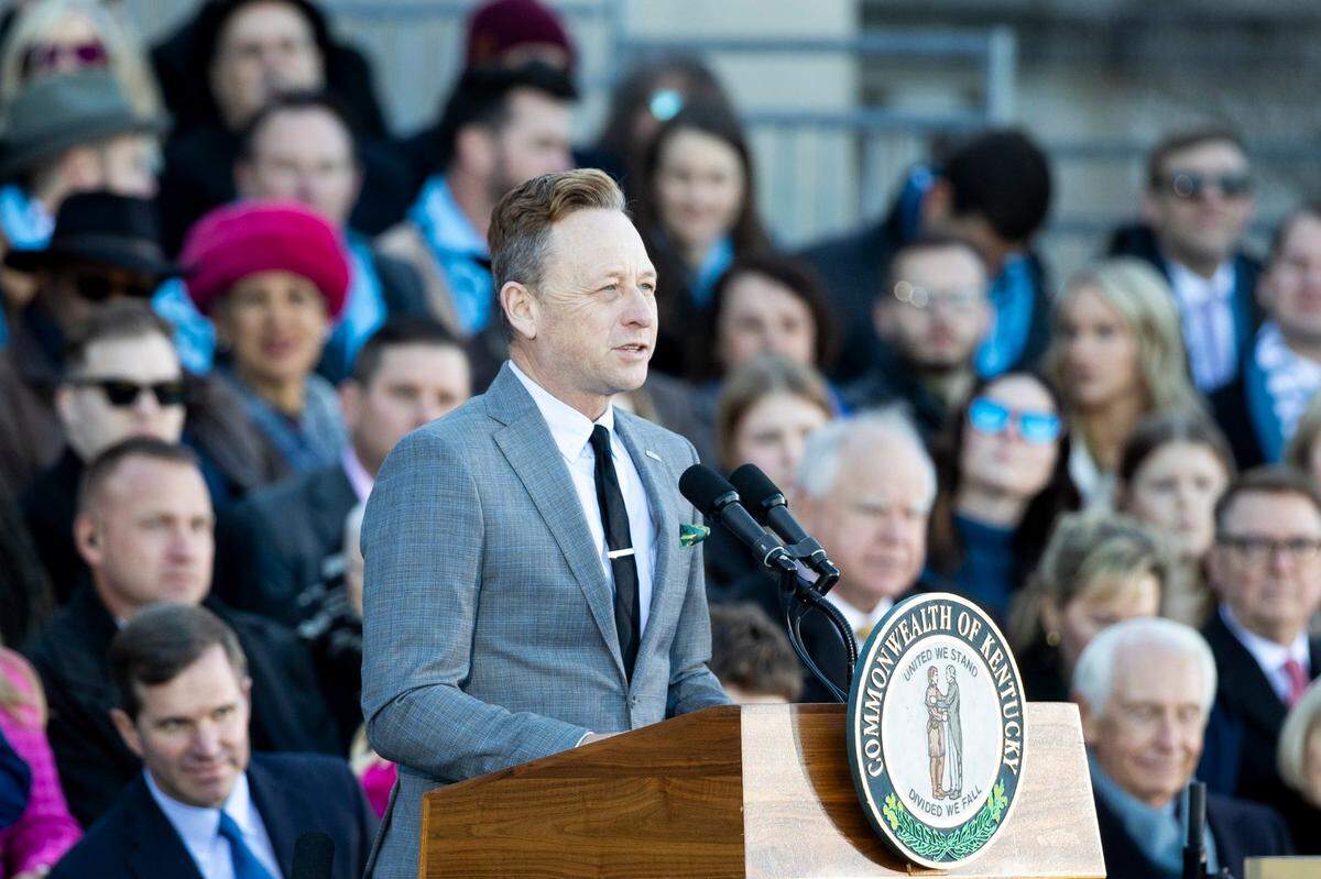 Poet Laureate of Kentucky Silas House recites a poem during the second inauguration of Gov. Andy Beshear at the capitol in Frankfort, Ky, Dec. 12, 2023.