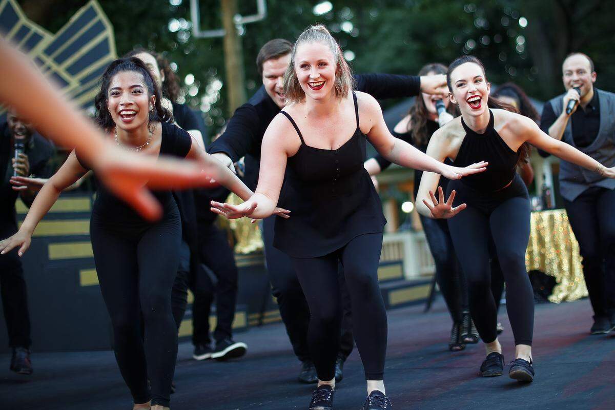Sylvannah Regalado, from left, Lauren Sandberg, and Claire McDermott, all of Lexington, Ky., perform ÒWe DanceÓ from Once on This Island on stage during “Broadway Under the Stars” presented by the Kentucky Conservatory Theatre for SummerFest 2019 at Woodland Park in Lexington, Friday, July 5, 2019. Broadway Under the Stars features a medley of performances from previous SummerFest productions. Sunday’s show begins in Woodland Park at 8 p.m.