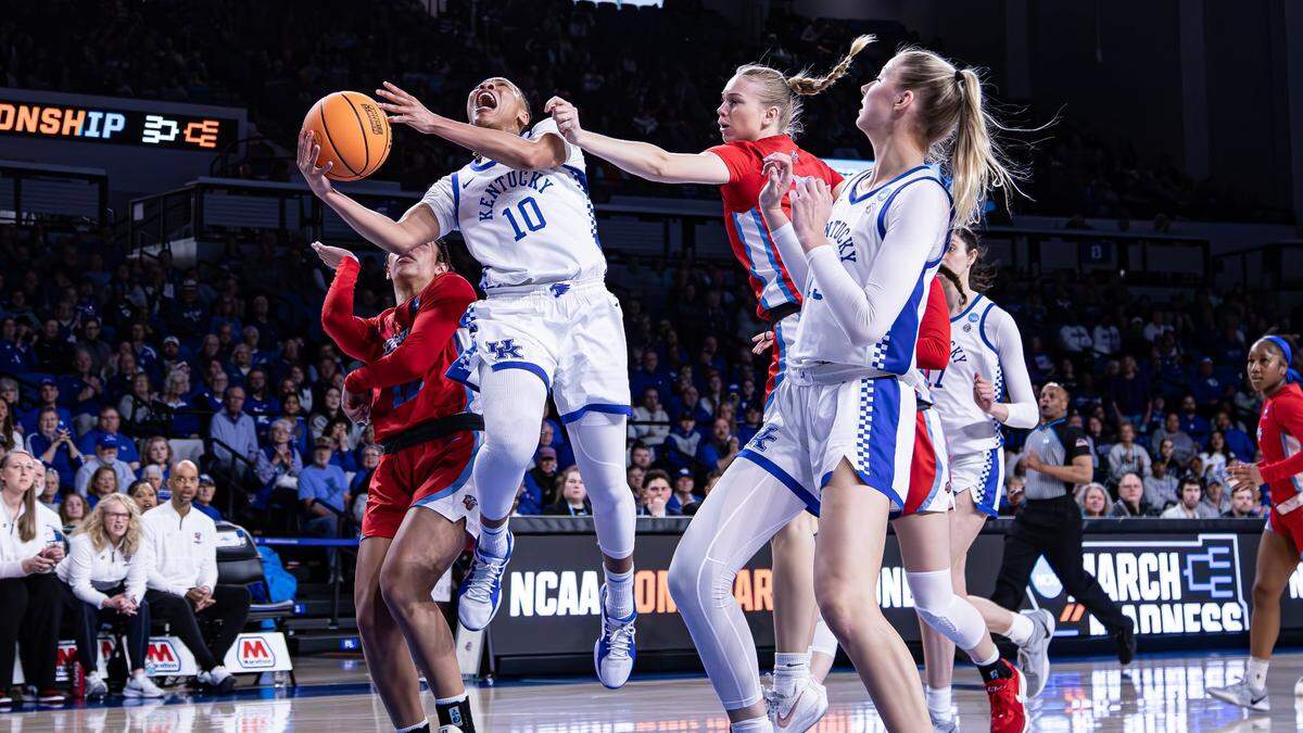 Kentucky’s Dazia Lawrence (10) goes airborne for the two and gets fouled for the free-throw during the 20 Conference Championships, NCAA Tournament at Memorial Coliseum in Lexington, Ky on March 21, 2025.