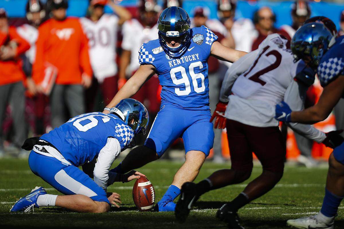 Kentucky place-kicker Matt Ruffolo (96) hit a 40-yard field goal in the third quarter of UK’s 37-30 win over Virginia Tech in the Belk Bowl after holder Grant McKinniss was able to get a high snap placed.