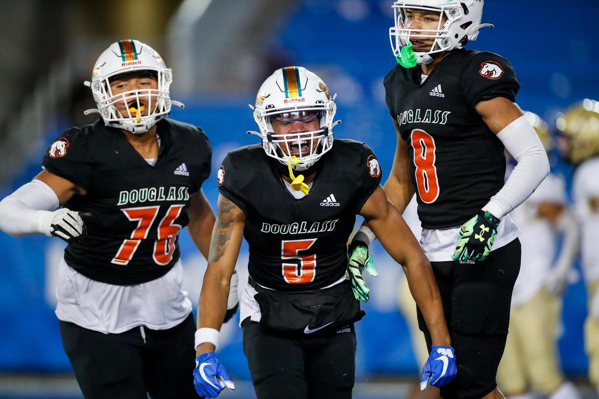 Tylon Webb (5) celebrates after making a 37-yard touchdown catch in the second quarter against Bowling Green on Saturday night. Webb finished the game with three catches for 94 yards.