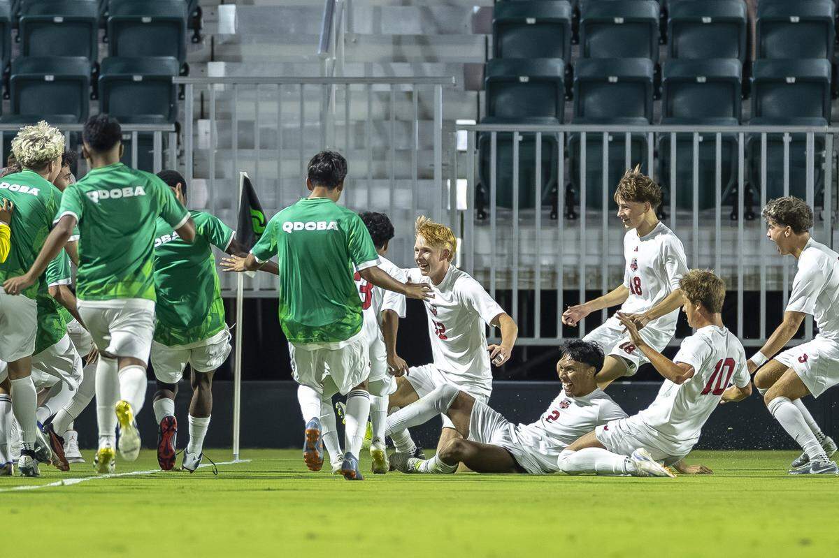 Dunbar's Adam Fidowicz (32) celebrates with his team after scoring a goal during a match against Henry Clay at Lexington Sporting Club Stadium in Lexington, Ky., on Thursday, Aug. 28, 2025. It was the first high school game played at Lexington Sporting Club Stadium.