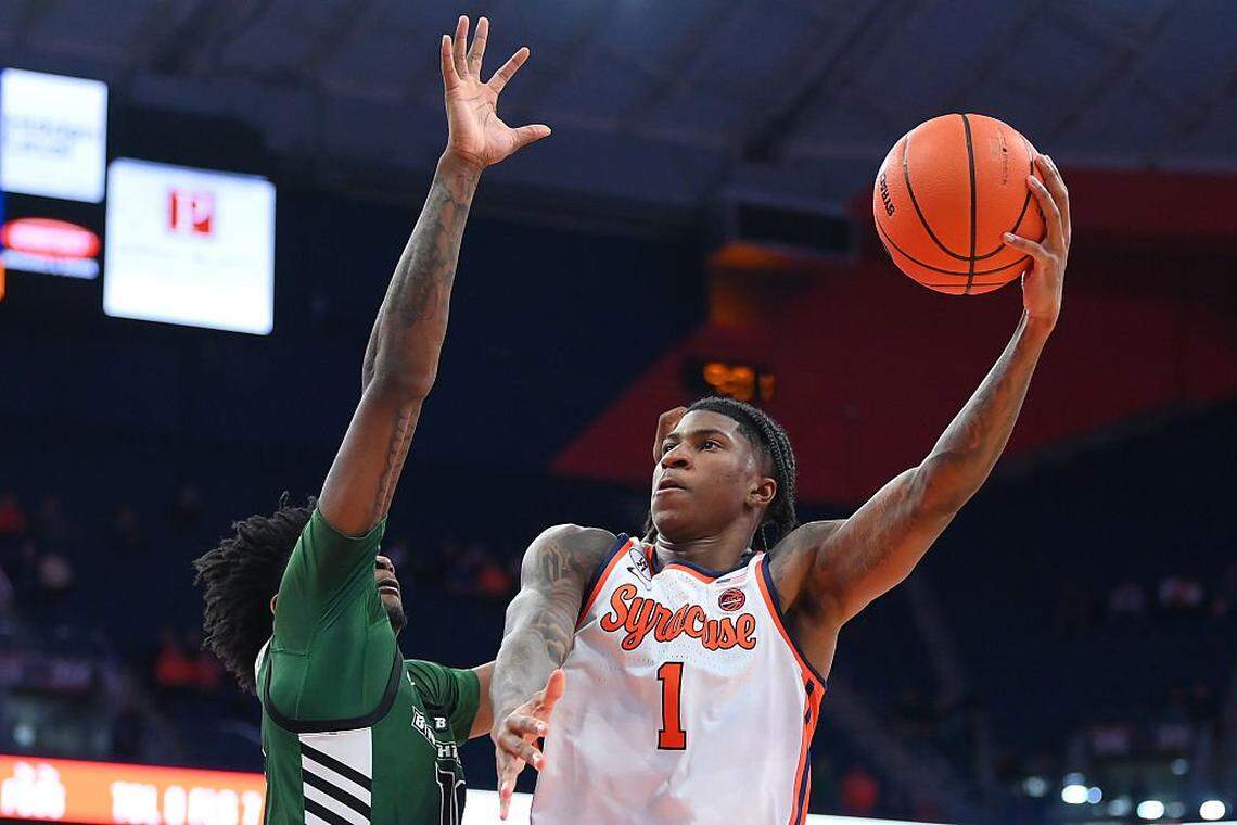 SYRACUSE, NEW YORK - NOVEMBER 3: Donnie Freeman #1 of the Syracuse Orange shoots against Zyier Beverly #10 of the Binghamton Bearcats during the second half at the JMA Wireless Dome on November 3, 2025 in Syracuse, New York. Syracuse won 85-47. (Photo by Rich Barnes/Getty Images)