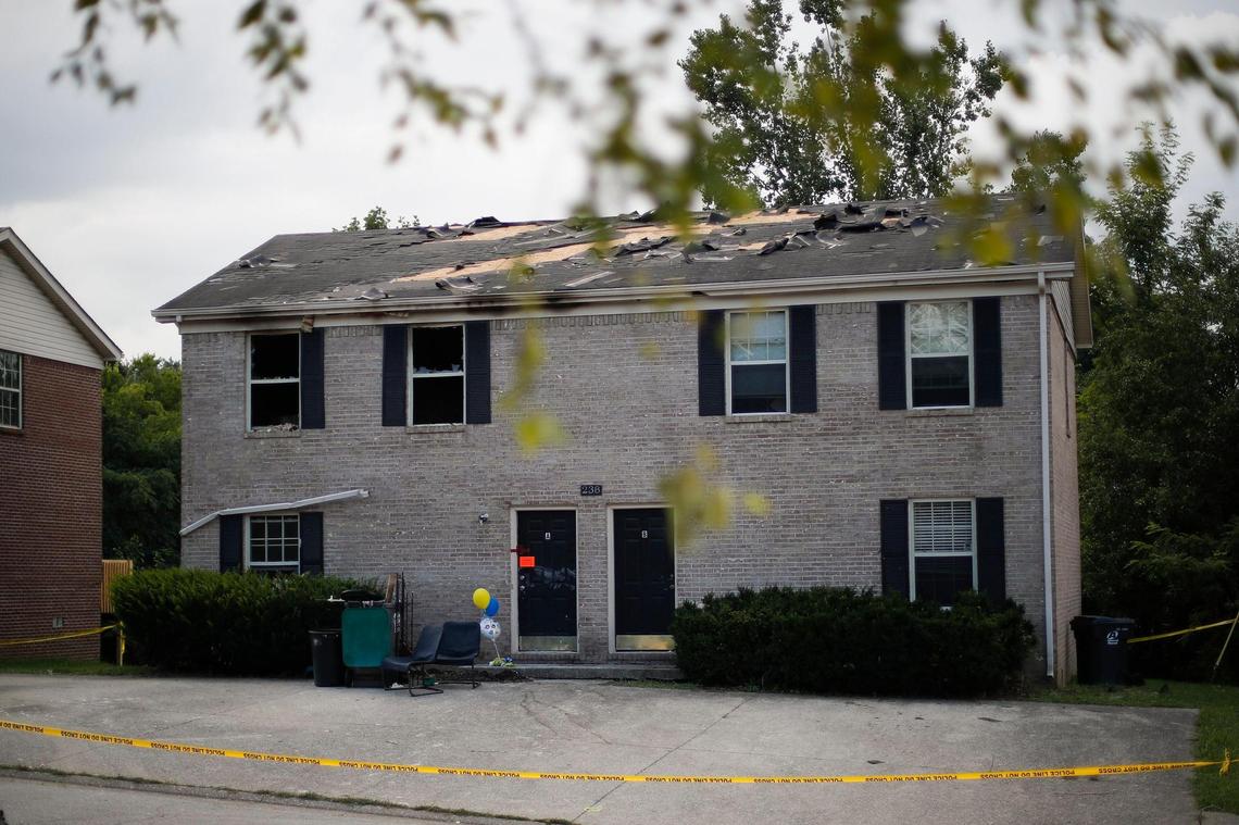 Police tape was wrapped around an apartment building at 238 Keystone Drive in Richmond, Ky., Wednesday, Aug. 4, 2021. Thomas C. Birl was arrested after he allegedly shot and killed Christopher Hager and Gracie Hager and setting the building on fire on Tuesday, Aug. 3, 2021.