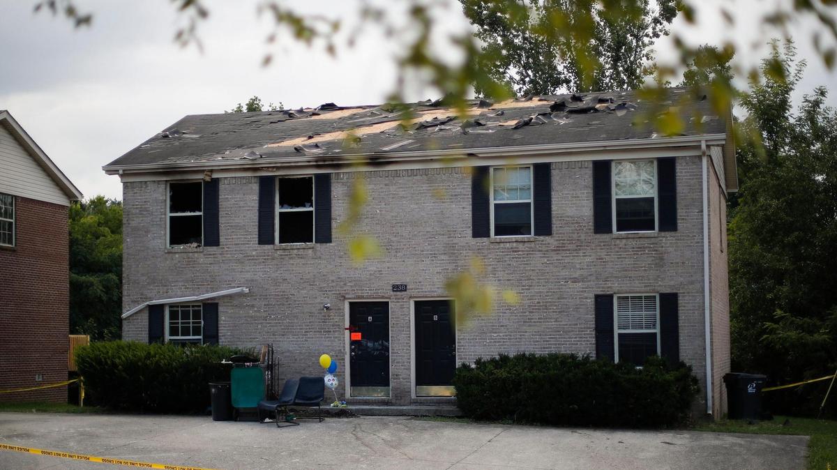 Police tape was wrapped around an apartment building at 238 Keystone Drive in Richmond, Ky., Wednesday, Aug. 4, 2021. Thomas C. Birl was arrested after he allegedly shot and killed Christopher Hager and Gracie Hager and setting the building on fire on Tuesday, Aug. 3, 2021.