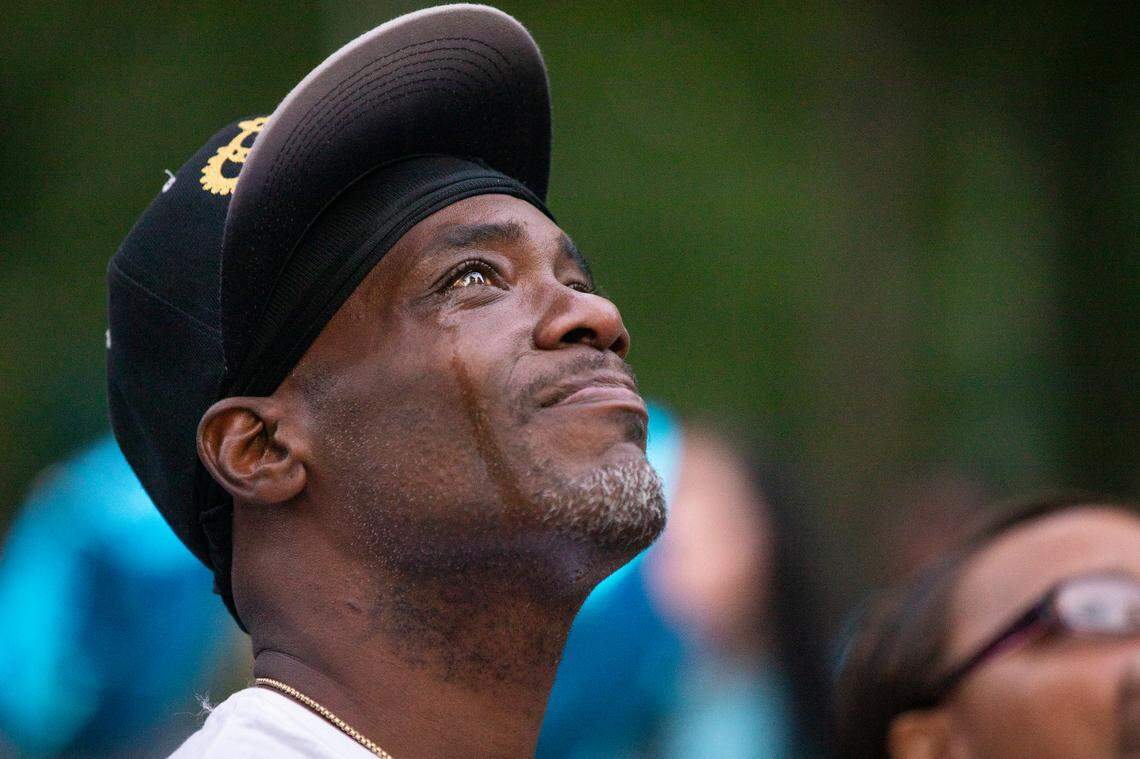 Elijah Morgan sheds a tear and looks to the sky during a vigil for his son, Daezon Morgan, where he was involved in a motorcycle accident at the intersection of Richmond Rd and Preston Ave in Lexington, Ky., Monday, June 15, 2020. Morgan died from the injuries he sustained in the accident.