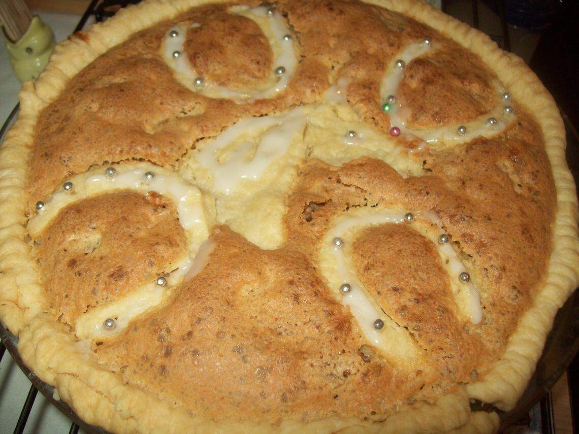 Barbara Harper Bach’s Racetrack Pie is a variation on the classic Kentucky pie with bourbon, chocolate and nuts. She uses cutouts to give it a festive look, then dresses it with bourbon whipped cream for serving.