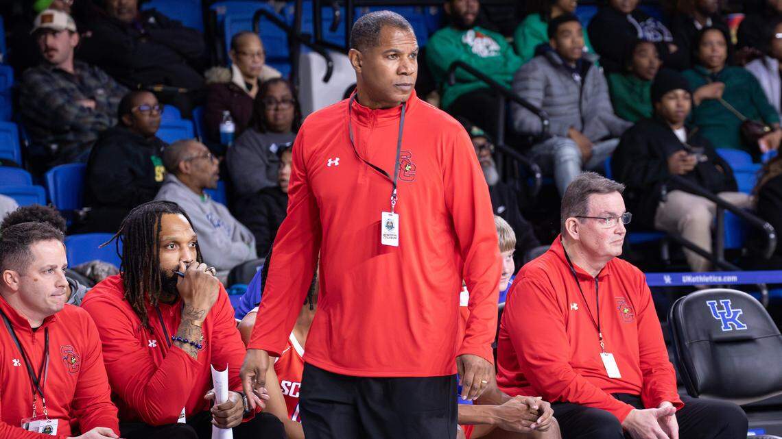 Parents file lawsuit against former UK player, Scott County coach