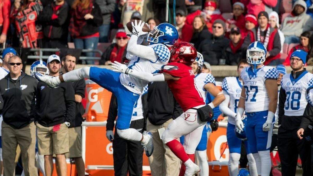 Kentucky safety Mike Edwards made the first of his two interceptions of Louisville quarterback Lamar Jackson in UK’s 41-38 upset of No. 11 U of L in 2016, the Wildcats’ most recent visit to Cardinal Stadium.