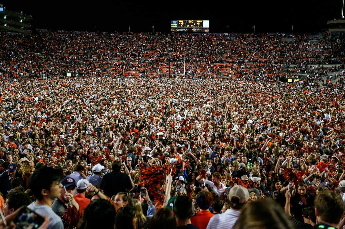 Auburn fans stormed the field after the Tigers defeated Alabama last season. How soon will we see a scene like this again, and will there even be college football this fall?