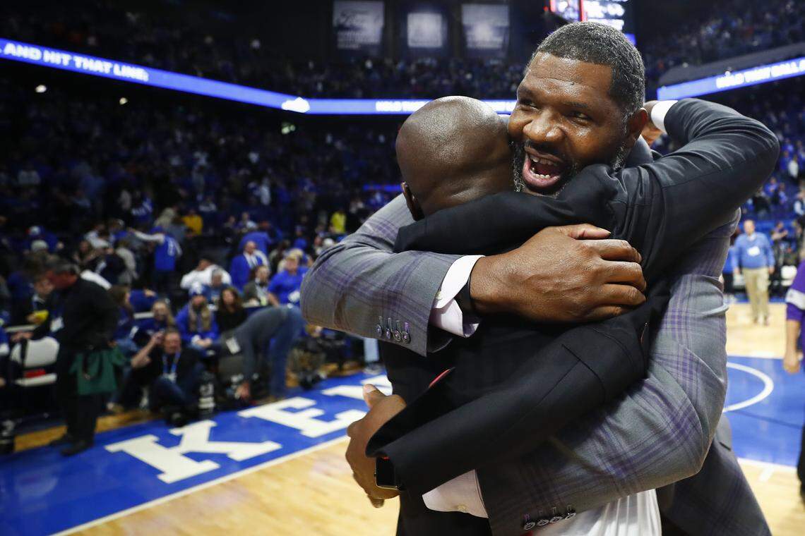 Evansville Aces head coach Walter McCarty celebrates after their game against the Kentucky Wildcats at Rupp Arena in Lexington, Ky., Tuesday, Nov. 12, 2019.